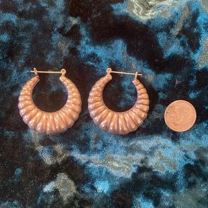 Sterling silver hoops.